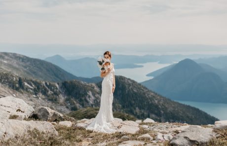 Beautiful bride married on rocky mountains with beautiful boho bouquet.