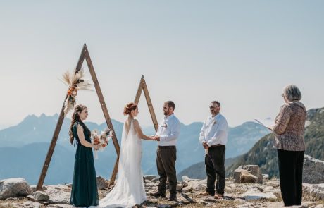 Beautiful couple exchange vows during the elopement wedding on the mountain