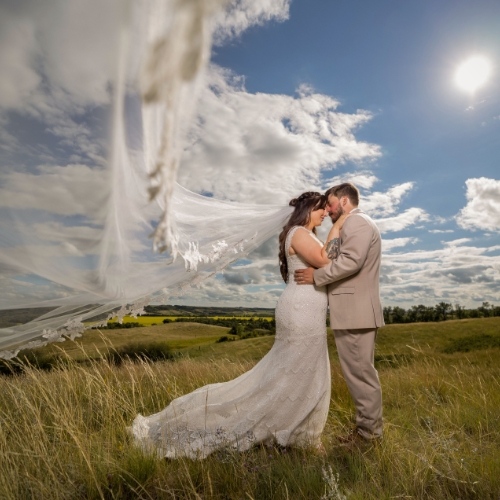 A touching moment for this couple at Lumsden Saskatchewan wedding