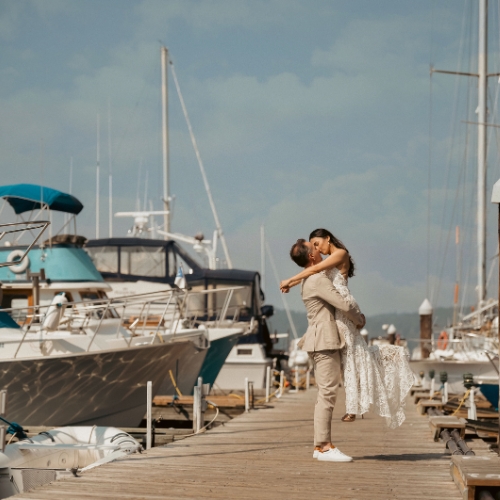 Bride kiss the Groom at the wedding in Poet's Cove Resort and Spa at Pender Island British Columbia